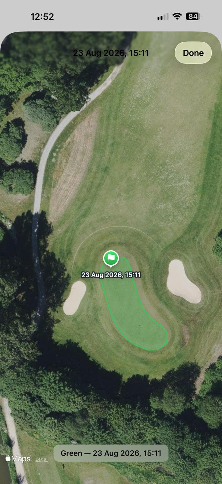 Satellite view of a hole with the scanned green outlined and a flag marker on it, ready to name the scan after the course.